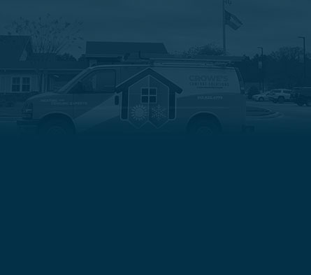 Crowe's Comfort Solutions service van parked outside, featuring logo with heating and cooling symbols, emphasizing HVAC services in Pooler, GA.
